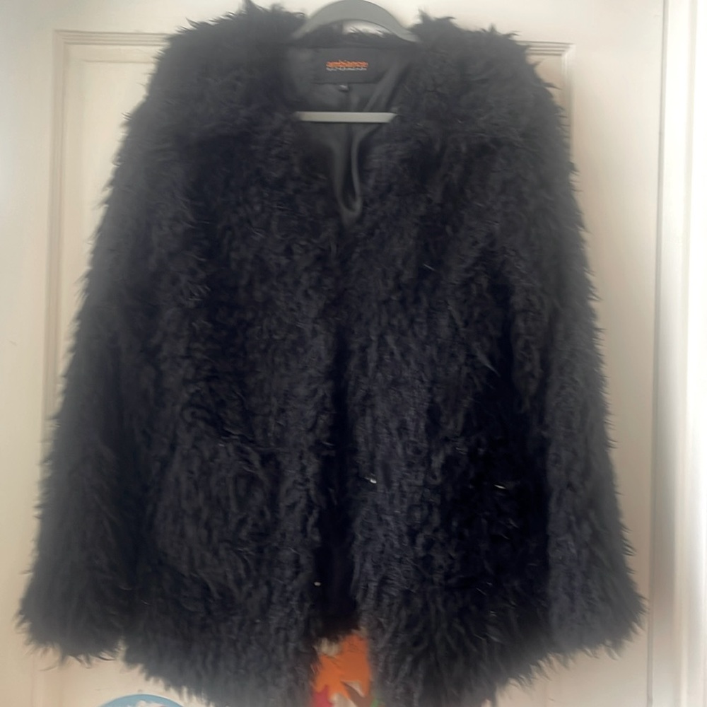 Black teddy bear style ambiance jacket to keep you warm.